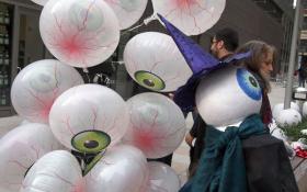 “I of the Beholder” was the theme of the 2011 Greenwich Village Halloween Parade, inspired by French surrealist painter Odilon Redon’s “Eye Balloon” —— hence the eyeball balloons. The 2012 parade was canceled in the wake of Superstorm Sandy.